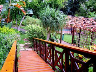 A boardwalk from the deck of a house