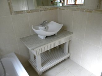 A Single Basin With Tiled Bathroom. Double Basins Are Also Installed Regularly
