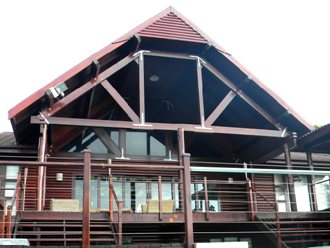 Frontal view of house with high pitch roof