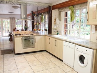 Kitchen With Granite Tops And Porcelain Floor