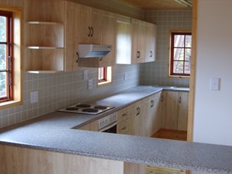 Kitchen with 'wrap' laminated kitchen units.