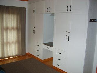 Modern, clean line built-in cupboards.