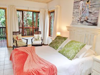 White Bedroom Furniture Made By Southbroom Timber Homes. Ceramic Floors, White Walls. Note Ample Windows